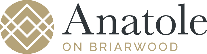 A logo with the text "Anatole on Briarwood" in a green and gold color scheme.